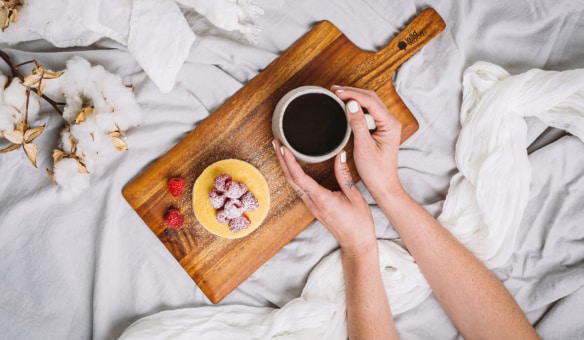 round wooden cheese board with handle