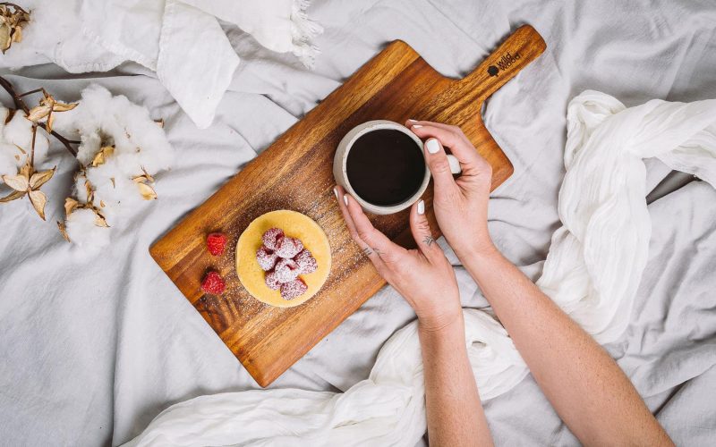 round wooden cheese board with handle